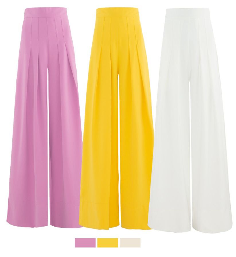 Conjunto em crepe calça e croped possui detalhe de laço mnagas com babados